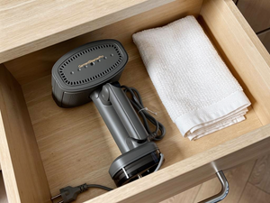 Folded flat in a kitchen drawer